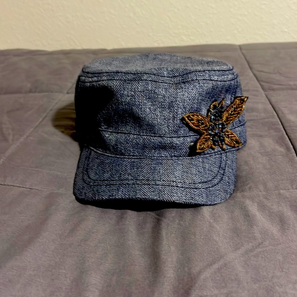 One size fits all hat w embellishment on front left side